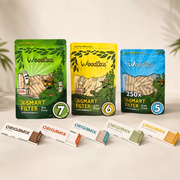 Three colorful Weedlez Filter pouches (green, yellow, blue) labeled The Smart Filter with sizes 7mm, 6mm, 5mm, arranged on a table beside OrigamiMix packs.