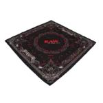 Black bandana with red and white paisley pattern and RAW branding in the center