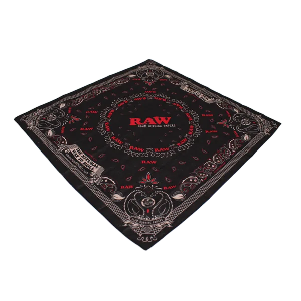 Black bandana with red and white paisley pattern and RAW branding in the center
