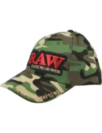 Camouflage baseball cap featuring a red RAW patch and the slogan 'The natural way to roll' along the brim.
